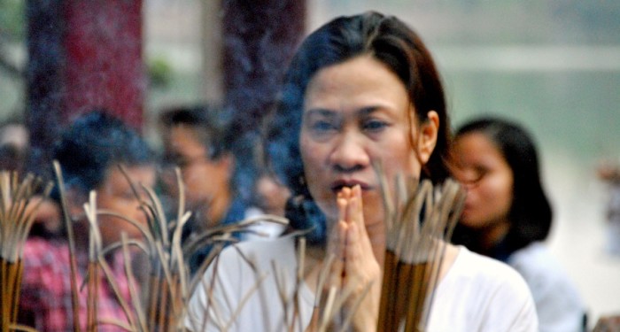 Vietnamiti in preghiera