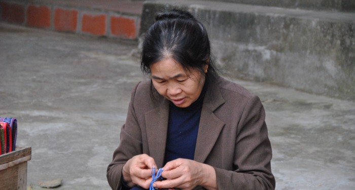 Venditrice di braccialetti, Vietnam - Hoi An